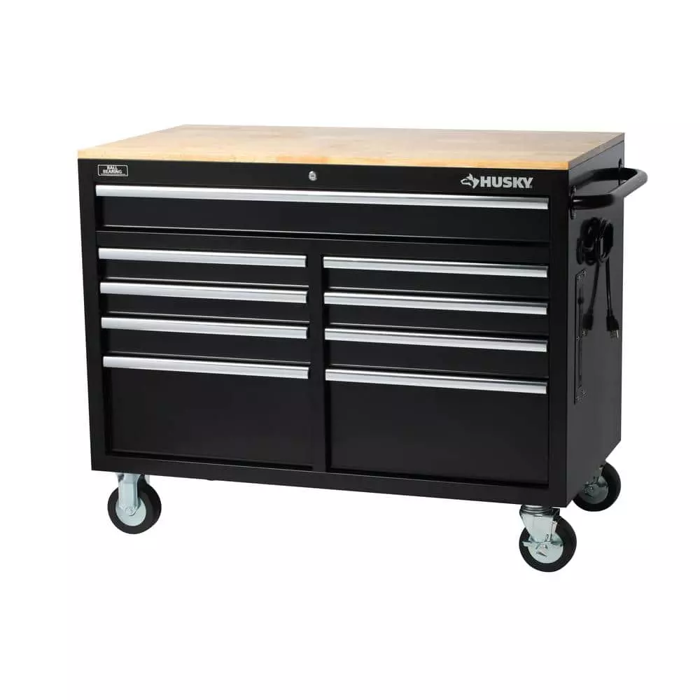Husky 46 in. W x 24.5 in. D Standard Duty 9-Drawer Mobile Workbench Tool Chest with Solid Wood Top in Gloss Black 3 Husky 46 in. W x 24.5 in. D Standard Duty 9-Drawer Mobile Workbench Tool Chest with Solid Wood Top in Gloss Black