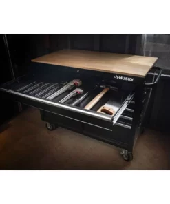 Husky 46 in. W x 24.5 in. D Standard Duty 9-Drawer Mobile Workbench Tool Chest with Solid Wood Top in Gloss Black 24 Husky 46 in. W x 24.5 in. D Standard Duty 9-Drawer Mobile Workbench Tool Chest with Solid Wood Top in Gloss Black -FixPro Store gloss black with silver trim husky mobile workbenches h46mwc9v2 c3 1000